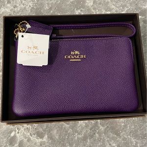 NWT Coach Wristlet in Purple Embossed Leather with gold hardware and logo